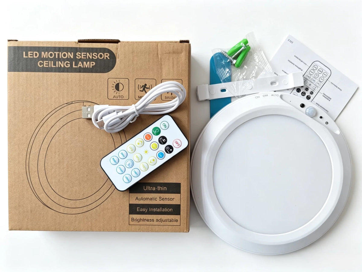 Lumora's SmartLight with its included remote control and mounting hardware
